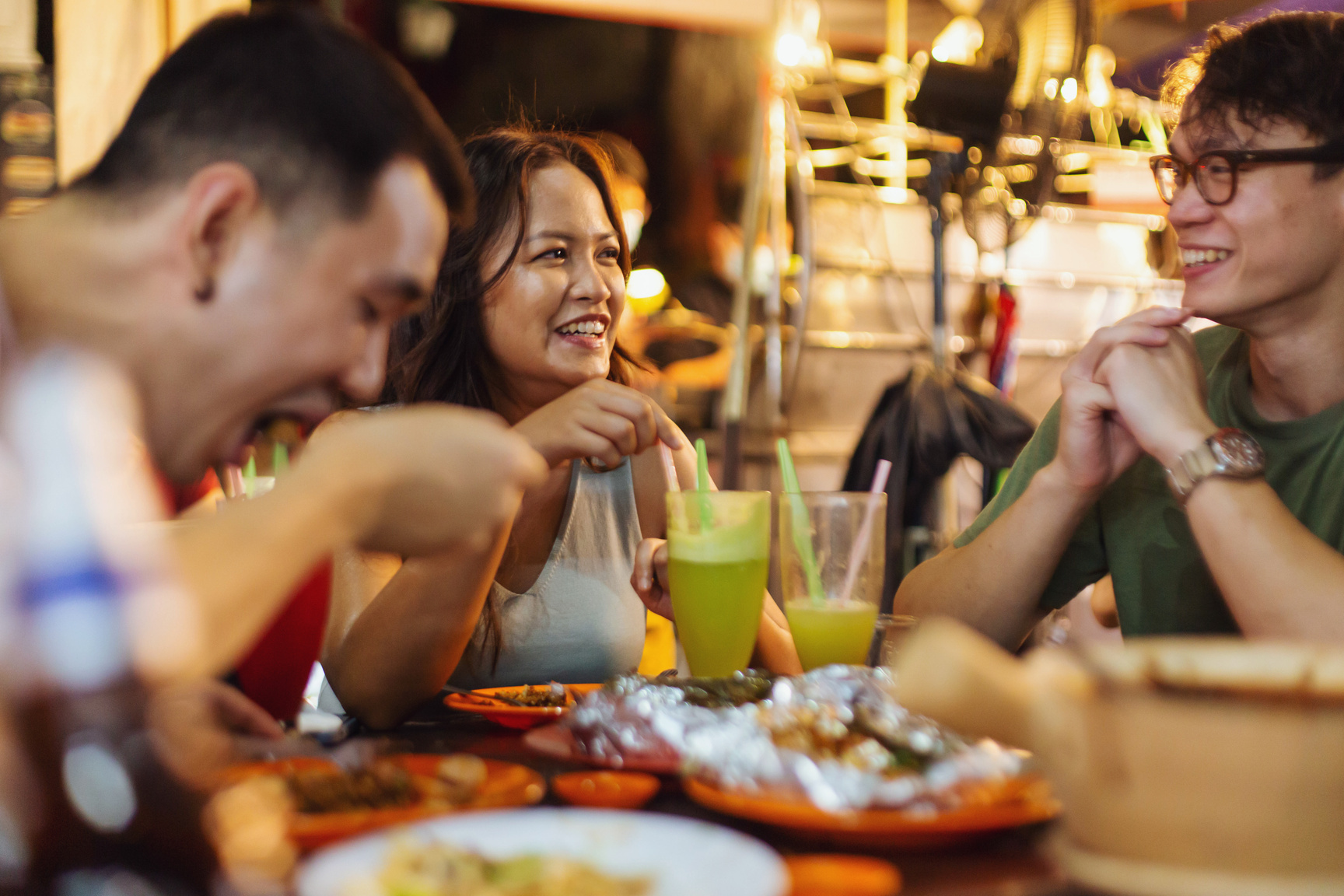Friends Eating  and Hanging Out in Night Market