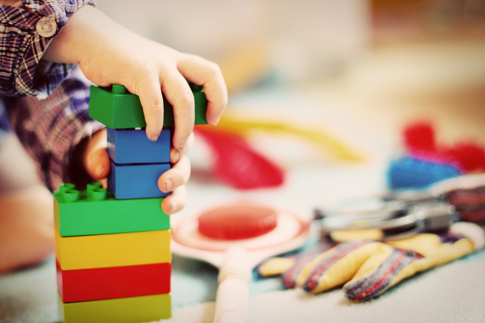 Child Playing Wooden Blocks